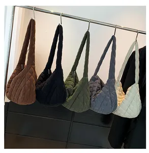 Detailed display of quilted corduroy tote bags in five earthy autumn colors with zippers