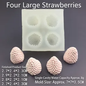 Macro shot of 4-cavity silicone mold with detailed strawberry texture for DIY candles