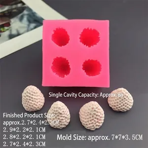 Detail view of pink silicone strawberry mold with dimensions 7x7x3.5cm and 8g capacity