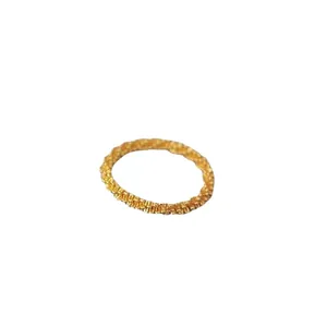Minimalist gold chain textured ring with a sparkling woven finish for stylish women