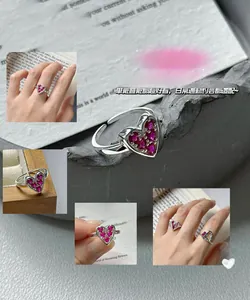 Detailed view of S925 sterling silver ring with rose red zircon heart and adjustable band