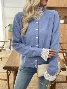 Elegant light blue knit cardigan with lace collar detail and white quilted chain bag
