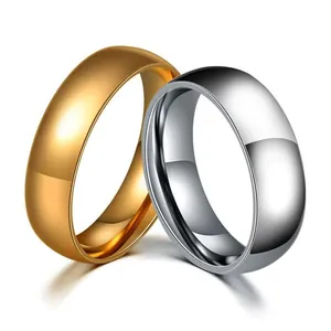 Detailed mirror-polished finish of minimalist gold and silver stainless steel rings