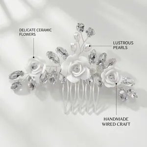 Detail of handmade bridal hair comb with ceramic roses, pearls and crystals on silver wire