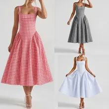 Detail view of square neck sleeveless dress with pleated waist in plaid and solid colors