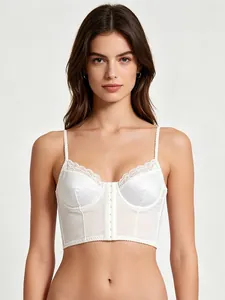 Detailed front view of white satin corset top with lace trim and hook-and-eye closure