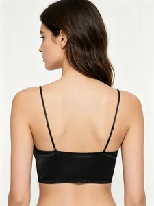 Rear view of black satin vest bra featuring adjustable thin straps and smooth texture