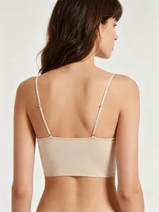 Detailed back view of a beige corset-style bra with adjustable straps and seamless edging