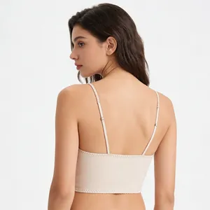 Back view of apricot corset vest with thin adjustable straps and wavy edge stitching