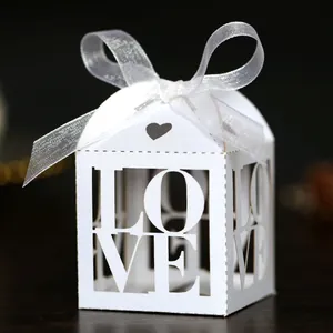 Elegant Hollow Out LOVE Heart Candy Box With Ribbon Bow Artificial Pearl Paper Gift Favor Box For Wedding Valentine Party Decoration