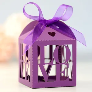 Detailed laser-cut purple gift box with LOVE hollow design and organza ribbon bow