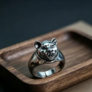 Macro shot of retro leopard head ring with vintage vulcanized silver finish and metal details