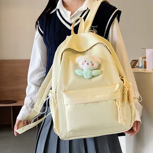 Sac à dos esthétique en nylon crème avec pendentif en peluche et fermetures éclair