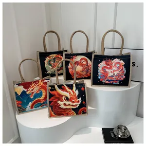 Collection of tote bags featuring various colorful dragon prints on minimalist display