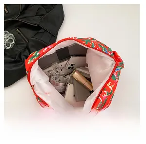 Detailed interior view of a floral tote bag showing large capacity for daily items