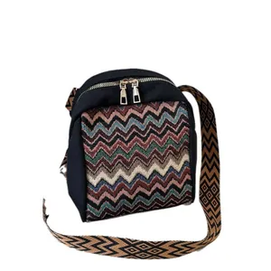 Ethnic style black canvas crossbody bag with colorful zigzag wave patterns and wide strap