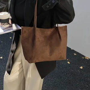 Minimalist large brown suede tote bag for women, ideal for daily commute and styling