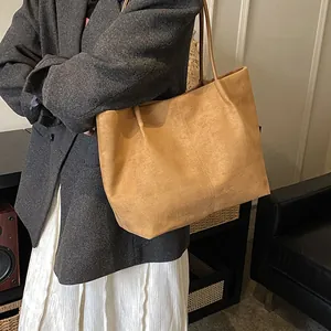 Vintage large capacity brown suede tote bag for women with elegant stitching detail