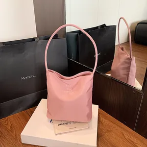 Pink nylon tote bag with Hope and Future embroidery and matching shoulder straps