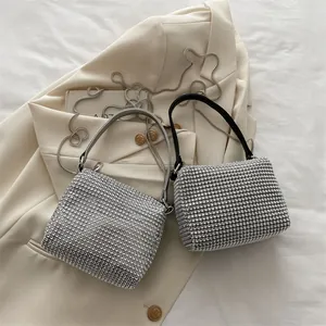 Sparkling rhinestone mini handbags in silver and black with elegant metal chain straps