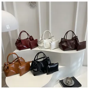 Detail showing high-quality PU leather tote bag set in five colors with soft texture