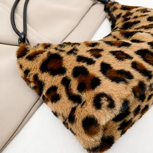 Detailed macro view of plush leopard print fabric texture and premium faux fur material