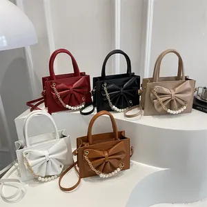 Sacs carrés tendance avec chaînes en perles et nœuds décoratifs en cinq coloris
