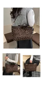 Detailed macro view of vintage leopard rose print tote bag with brown leather trim and gold logo