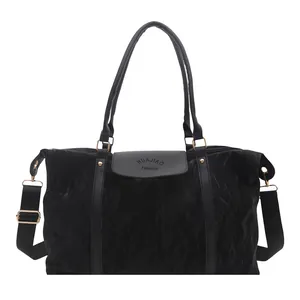 Large capacity black tote bag with wrinkled texture and adjustable nylon strap