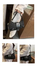 Detail view of black vintage motorcycle bag with silver buckles and pleated canvas texture