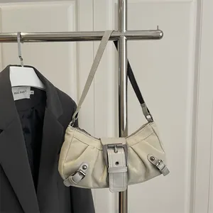 Retro beige leather hobo bag with vintage buckle and pleated design for commuting