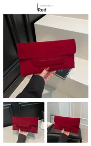 Detail of the triple-layered envelope design on this elegant burgundy suede clutch bag
