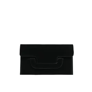 Minimalist black suede envelope clutch bag with distinctive T-shaped flap closure