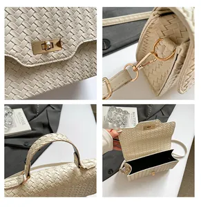 Detail of woven beige leather texture, gold press lock and interior pocket of the bag