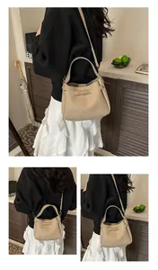 Detailed views of a beige pebbled leather bucket bag with gold hardware and shoulder strap