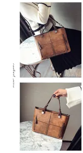 Close-up of vintage brown PU leather tote bag showing dual front pockets and metal zippers