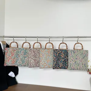 Große Baumwoll-Leinen-Tasche mit Blumenmuster und Bambusgriffen für den Alltag