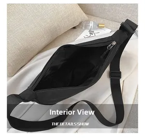 Interior view of black nylon dumpling bag showing large capacity and smooth inner lining