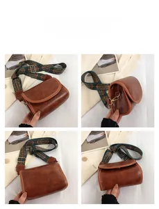 Sac bandoulière rétro marron doté d'une large sangle brodée de style ethnique