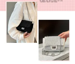Detail view of rhinestone crossbody bags in black and white with elegant silver chain straps