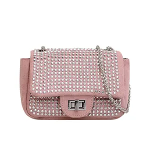 Elegant pink rhinestone square crossbody bag with silver chain strap on white background