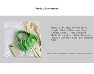 Detail view of bright green ruched cloud bag with size specs and 17cm handle height