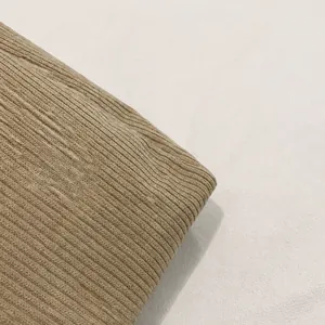 Close-up of the thick khaki corduroy fabric texture for large capacity tote bag