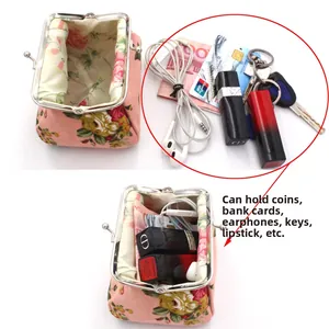 Floral canvas coin purse detail showing storage for cards, keys, lipstick and earphones