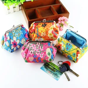 Vintage floral embroidered coin purses with retro metal clasp closures and jacquard fabric