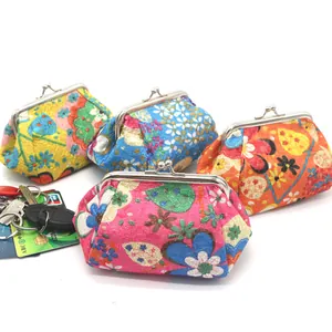 Vintage embroidery coin purses with metal clasps in various floral fabric patterns