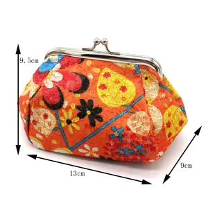 Vintage floral embroidery coin purse with metal clasp closure and orange flower fabric pattern