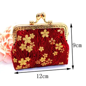 Handmade red floral Japanese style coin purse with gold metal frame and cherry blossom pattern