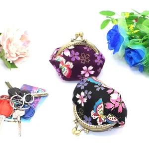 Japanese style fabric coin purse with cherry blossom pattern and metal kiss lock