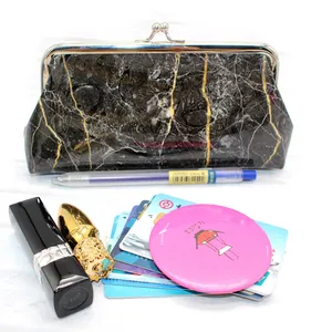Retro marble pattern wallet with vintage metal kiss-lock clasp on white background